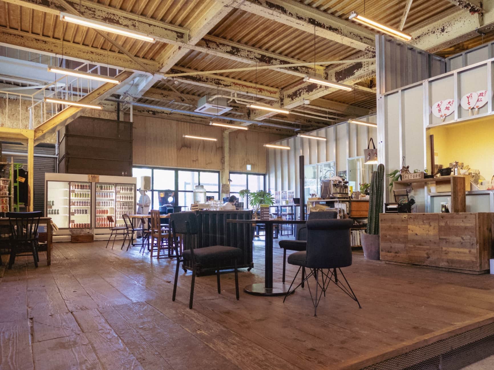 Stylish Renovated Warehouse Cafe with Industrial Interior Design