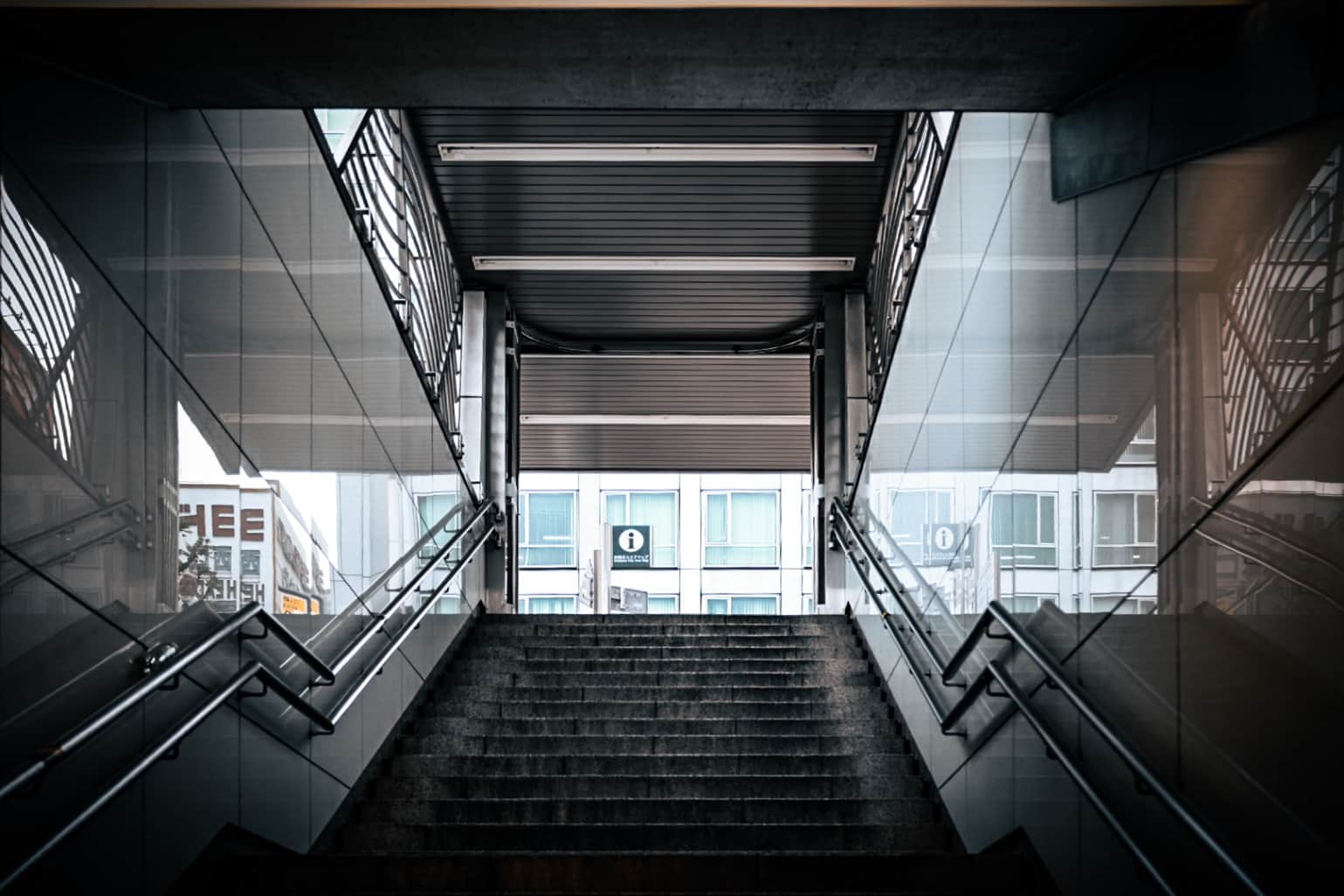 Symmetrical Urban Staircase Leading to City Entrance